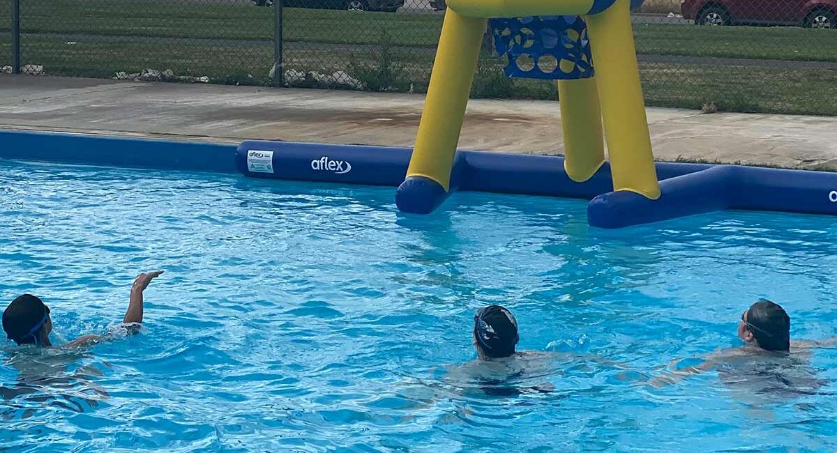 Kids Playing With New Hoop at Jackson Pool